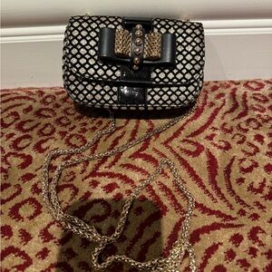 CHRISTIAN LOUBOUTIN GOLD AND BLACK mini bag